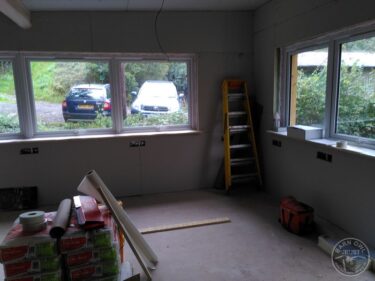 Plasterboard outside walls in admin (2)