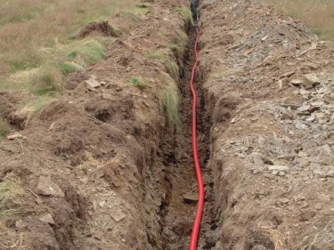 Electrocution Wires Electricity Cable Being Buried In A Trench